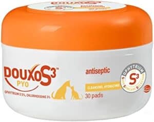 A white and orange container of Douxo S3 PYO antiseptic cleansing and hydrating pads for pets, featuring images of a cat and a dog and labeled for antiseptic use; contains 30 pads.