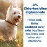 A small white dog stands on grass next to text that reads: 3% Chlorhexidine digluconate helps red, itchy, scabbed over skin heal from flea bites and other skin infections.