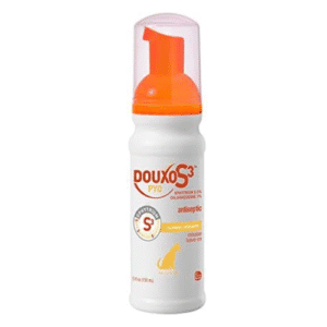 A white and orange 5.1 fl. oz. bottle of Douxo S3 Pyo Mousse for dogs, with 3% chlorhexidine & 0.5% ophytrium, antiseptic and hydrating for bacterial or yeast skin infections, features a pump dispenser and pet silhouette on the label.